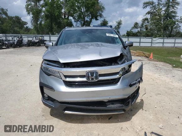 2021 Honda Pilot Touring 8-Passenger with VIN 5FNYF6H90MB079698, listed as a Copart auction lot 52011005 with 90,331 mi miles and Non repairable. Bid and sale history available at DreamBid. Image 5.