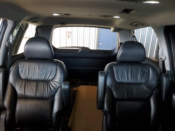 2008 Honda Odyssey Touring with VIN 5FNRL38998B052646, listed as a Copart auction lot 58357145 with 200,943 mi miles and Salvage title. Bid and sale history available at DreamBid. Image 10.