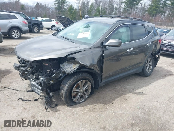 2014 Hyundai Santa Fe with VIN 5XYZUDLB6EG213889, listed as a IAAI auction lot 42036202 with 188,247 mi miles and . Bid and sale history available at DreamBid. Image 2.