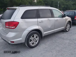2012 Dodge Journey SXT with VIN 3C4PDCBBXCT323532, listed as a IAAI auction lot 42471610 with 188,103 mi miles and . Bid and sale history available at DreamBid. Image 4.