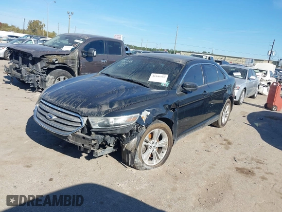 2014 Ford Taurus SEL z VIN 1FAHP2E84EG170133, wystawiony jako IAAI lot #41045369 z przebiegiem 261 732 mil mil oraz . Historia ofert i sprzedaży dostępna na DreamBid. Obrazek 18.
