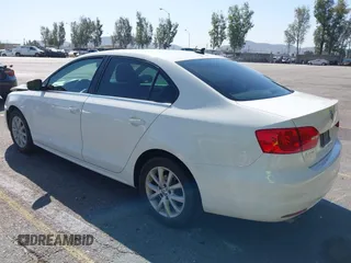 2013 Volkswagen Jetta SE with VIN 3VWDP7AJ9DM253878, listed as a IAAI auction lot 41974451 with 149,720 mi miles and . Bid and sale history available at DreamBid. Image 3.