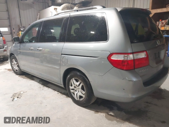 2007 Honda Odyssey EX-L with VIN 5FNRL38697B012944, listed as a IAAI auction lot 42144250 with 234,016 mi miles and . Bid and sale history available at DreamBid. Image 3.