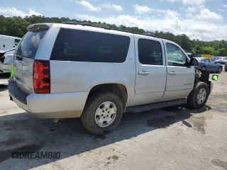 2011 Chevrolet Suburban LT с VIN 1GNSCJE00BR213311, выставлен на аукционе Copart как лот 55612835 с пробегом 219 379 миль миль и Списание • Salvage title. История ставок и продаж доступна на DreamBid. Изображение 3.