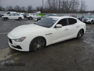 2014 Maserati Ghibli S Q4 z VIN ZAM57RTA0E1097837, wystawiony jako Copart lot #47486655 z przebiegiem 73 698 mil mil oraz Tytuł czysty. Historia ofert i sprzedaży dostępna na DreamBid. Obrazek 1.