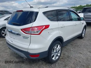 2015 Ford Escape Titanium with VIN 1FMCU0J91FUB13810, listed as a IAAI auction lot 41961798 with 139,265 mi miles. Bid and sale history available at carsss.com. Image 4.