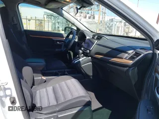 2019 Honda CR-V EX z VIN 5J6RW1H59KA012571, wystawiony jako IAAI lot #41830202 z przebiegiem 49 987 mil mil oraz . Historia ofert i sprzedaży dostępna na DreamBid. Obrazek 5.