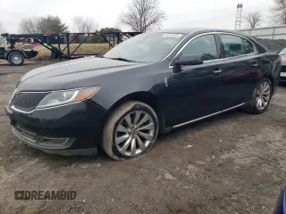 2015 Lincoln MKS with VIN 1LNHL9DK6FG603234, listed as a Copart auction lot 85581964 with 129,979 mi miles and Salvage Title. Bid and sale history available at carsss.com. Image 1.