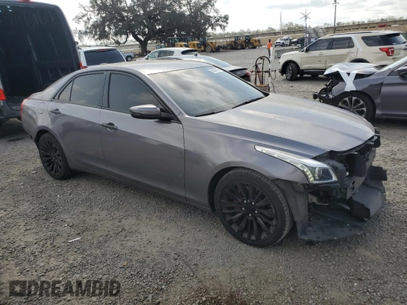 2015 Cadillac CTS Luxury RWD with VIN 1G6AR5SX0F0115632, listed as a Copart auction lot 45395555 with 140,119 mi miles and Salvage Title. Bid and sale history available at DreamBid. Image 4.