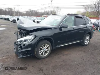 2014 BMW X5 xDrive35i z VIN 5UXKR0C51E0H26528, wystawiony jako IAAI lot #42027626 z przebiegiem 87 228 mil mil oraz . Historia ofert i sprzedaży dostępna na DreamBid. Obrazek 19.