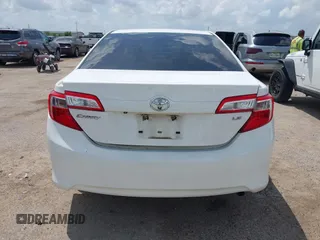2014 Toyota Camry L with VIN 4T4BF1FK2ER375590, listed as a IAAI auction lot 42101553 with 126,849 mi miles and . Bid and sale history available at DreamBid. Image 16.