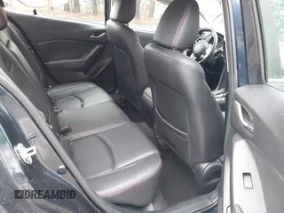 2015 Mazda 3 i Grand Touring with VIN 3MZBM1W78FM219833, listed as a IAAI auction lot 41578872 with 61,138 mi miles and . Bid and sale history available at DreamBid. Image 8.