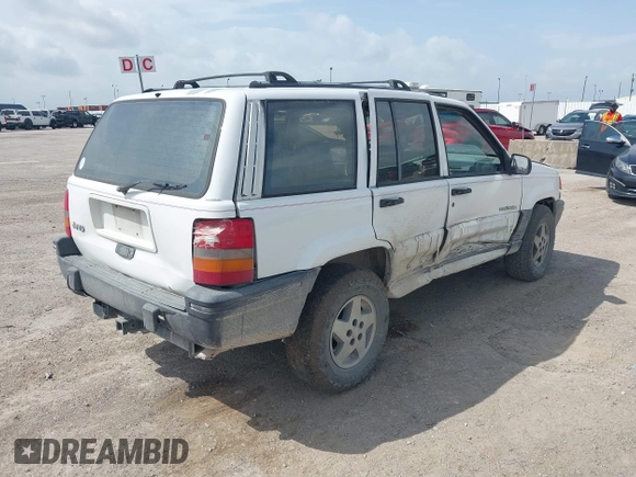 1994 Jeep Grand Cherokee Laredo with VIN 1J4FX58SXRC120936, listed as a IAAI auction lot 42530212 with 126,367 mi miles and . Bid and sale history available at DreamBid. Image 4.