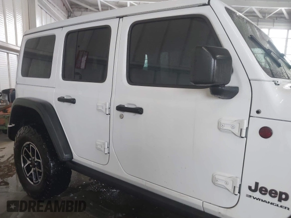 2024 Jeep Wrangler Rubicon with VIN 1C4PJXFG7RW334190, listed as a IAAI auction lot 42332948 with 14,272 mi miles and . Bid and sale history available at DreamBid. Image 13.