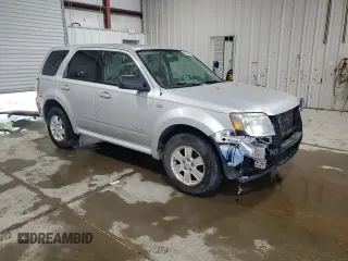 2008 Mercury Mariner с VIN 4M2CU91138KJ15103, выставлен на аукционе Copart как лот 60039585 с пробегом 157 481 миль миль и Списание • Salvage title. История ставок и продаж доступна на DreamBid. Изображение 4.