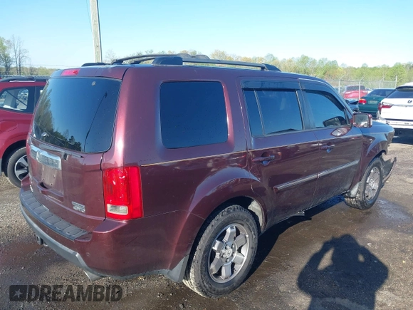2011 Honda Pilot Touring z VIN 5FNYF4H9XBB040893, wystawiony jako IAAI lot #41933530 z przebiegiem 161 725 mil mil oraz . Historia ofert i sprzedaży dostępna na DreamBid. Obrazek 4.