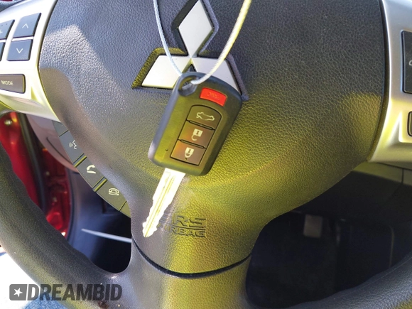 2016 Mitsubishi Lancer ES z VIN JA32U2FU3GU001857, wystawiony jako IAAI lot #41999674 z przebiegiem 65 520 mil mil oraz . Historia ofert i sprzedaży dostępna na DreamBid. Obrazek 11.