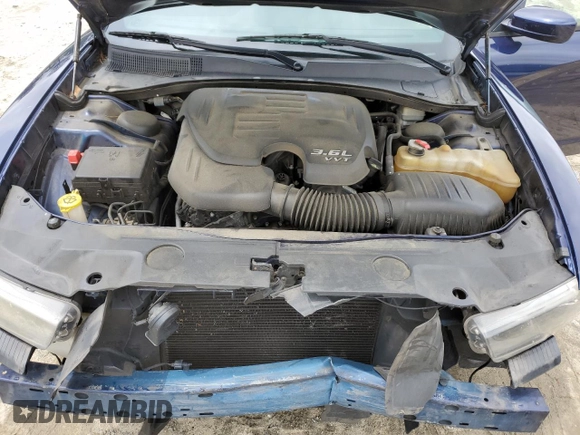 2014 Dodge Charger SXT z VIN 2C3CDXHG2EH184196, wystawiony jako Copart lot #55803035 z przebiegiem 140 707 mil mil oraz Szkoda całkowita • Salvage title. Historia ofert i sprzedaży dostępna na DreamBid. Obrazek 11.
