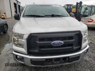2015 Ford F-150 XLT with VIN 1FTEX1EP1FKF19892, listed as a Copart auction lot 57976715 with 179,507 mi miles and Salvage title. Bid and sale history available at DreamBid. Image 5.