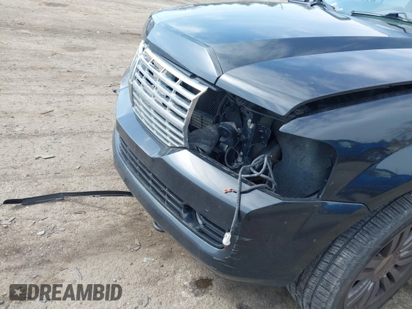 2014 Lincoln Navigator z VIN 5LMJJ2J53EEL08886, wystawiony jako IAAI lot #41971904 z przebiegiem 140 190 mil mil oraz . Historia ofert i sprzedaży dostępna na DreamBid. Obrazek 6.