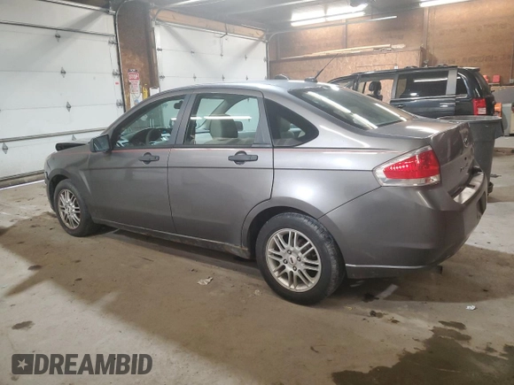 2009 Ford Focus SE with VIN 1FAHP35N59W222036, listed as a Copart auction lot 51323355 with 186,429 mi miles and Salvage Title. Bid and sale history available at carsss.com. Image 2.