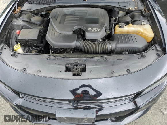 2015 Dodge Charger SXT с VIN 2C3CDXHG8FH852570, выставлен на аукционе Copart как лот 57896135 с пробегом 204 040 миль миль и Списание • Salvage title. История ставок и продаж доступна на DreamBid. Изображение 11.