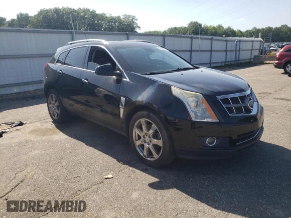 2011 Cadillac SRX Premium Collection with VIN 3GYFNFEYXBS547540, listed as a Copart auction lot 62563895 with 107,136 mi miles and Salvage title. Bid and sale history available at DreamBid. Image 4.