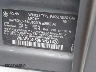2011 BMW 3 Series 328i xDrive with VIN WBAPK5G59BNN31420, listed as a IAAI auction lot 42087265 with 121,209 mi miles. Bid and sale history available at carsss.com. Image 9.