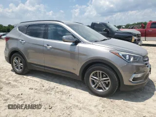 2018 Hyundai Santa Fe 2.4L with VIN 5XYZU3LB9JG563893, listed as a Copart auction lot 62058745 with 141,353 mi miles and Salvage title. Bid and sale history available at DreamBid. Image 4.