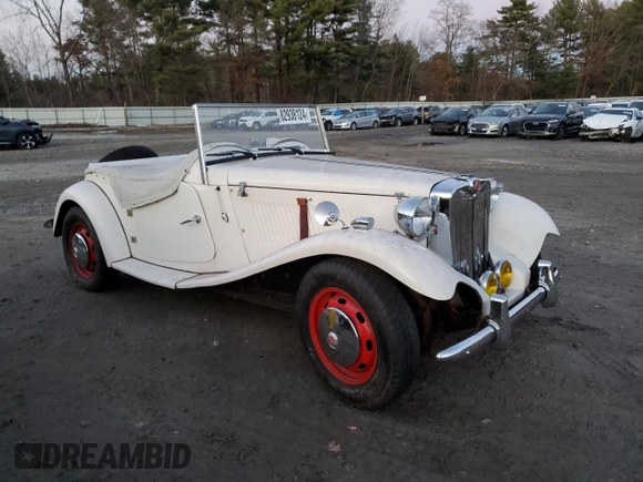 1971 Volkswagen Beetle with VIN 1112313102, listed as a Copart auction lot 82938124 with 3,677 mi miles and Salvage Title. Bid and sale history available at DreamBid. Image 4.