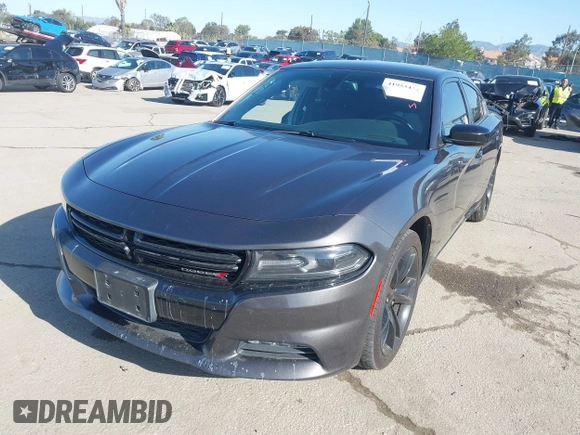 2016 Dodge Charger SXT with VIN 2C3CDXHG6GH327461, listed as a IAAI auction lot 41955412 with 124,775 mi miles and . Bid and sale history available at carsss.com. Image 2.