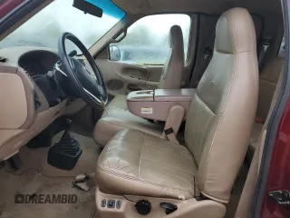 1997 Ford F-150 XL with VIN 1FTDX18W6VKC64721, listed as a Copart auction lot 57935585 with 180,222 mi miles and Clean title. Bid and sale history available at DreamBid. Image 7.
