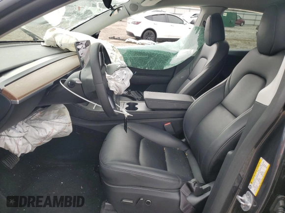 2024 Tesla Model Y с VIN 7SAYGDED1RF092027, выставлен на аукционе Copart как лот 51655485 с пробегом 22 010 миль миль и Списание • Salvage title. История ставок и продаж доступна на DreamBid. Изображение 7.