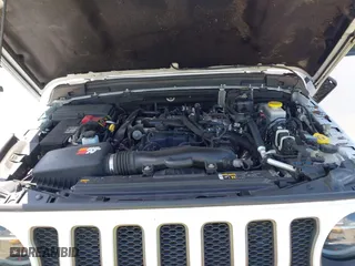 2021 Jeep Wrangler Unlimited Rubicon with VIN 1C4HJXFN9MW519496, listed as a IAAI auction lot 41676845 with 72,767 mi miles. Bid and sale history available at carsss.com. Image 10.