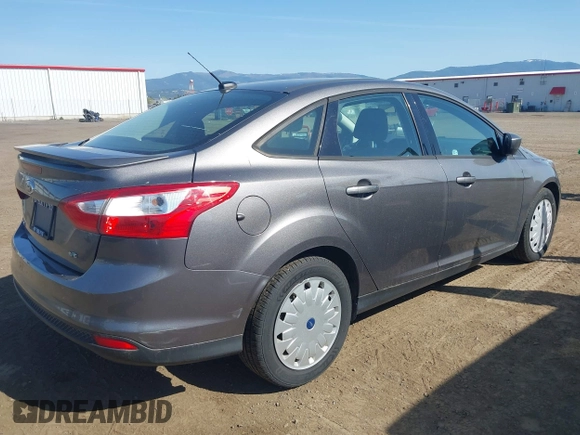 2012 Ford Focus SE with VIN 1FAHP3F26CL314852, listed as a IAAI auction lot 42162488 with 101,782 mi miles. Bid and sale history available at carsss.com. Image 4.