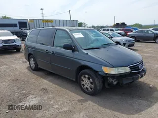 2004 Honda Odyssey EX-RES z VIN 5FNRL18824B138287, wystawiony jako IAAI lot #42245444 z przebiegiem 196 932 mil mil oraz . Historia ofert i sprzedaży dostępna na DreamBid. Obrazek 1.