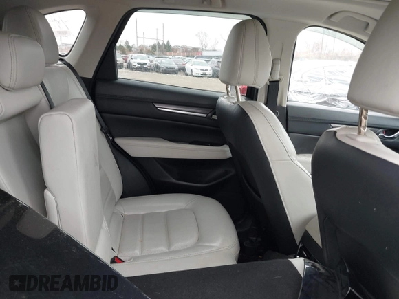 2021 Mazda CX-5 Grand Touring with VIN JM3KFADM0M1321375, listed as a IAAI auction lot 41913449 with 88,178 mi miles. Bid and sale history available at carsss.com. Image 8.