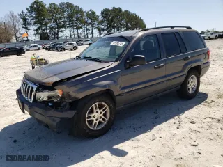 2003 Jeep Grand Cherokee Laredo with VIN 1J4GW48SX3C589100, listed as a Copart auction lot 49986745 with 247,687 mi miles and Salvage Title. Bid and sale history available at carsss.com. Image 1.