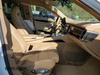 2014 Porsche Panamera с VIN WP0AA2A77EL008465, выставлен на аукционе Copart как лот 69671134 с пробегом Не указан миль и Чистый • Clean title. История ставок и продаж доступна на DreamBid. Изображение 7.