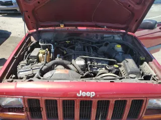1999 Jeep Cherokee Sport z VIN 1J4FF68SXXL525944, wystawiony jako Copart lot #57653905 z przebiegiem 102 057 mil mil oraz Szkoda całkowita • Salvage title. Historia ofert i sprzedaży dostępna na DreamBid. Obrazek 12.