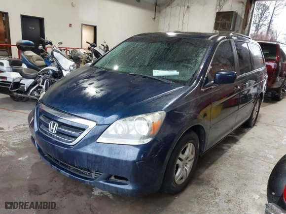 2007 Honda Odyssey EX-L with VIN 5FNRL38647B067415, listed as a IAAI auction lot 41690699 with 207,702 mi miles. Bid and sale history available at carsss.com. Image 2.