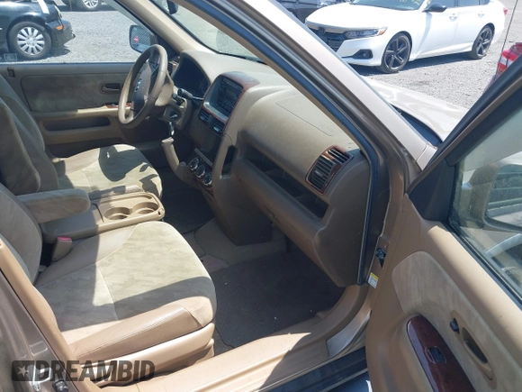 2004 Honda CR-V EX with VIN SHSRD78884U240721, listed as a IAAI auction lot 42161683 with 143,088 mi miles and . Bid and sale history available at carsss.com. Image 5.