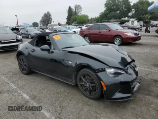 2021 Mazda MX-5 Miata Sport with VIN JM1NDAB70M0455950, listed as a Copart auction lot 54979915 with Not provided miles and Salvage title. Bid and sale history available at DreamBid. Image 4.