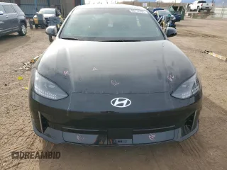 2024 Hyundai IONIQ 6 SEL with VIN KMHM34ACXRA056636, listed as a Copart auction lot 86772594 with 7,054 mi miles and Salvage Title. Bid and sale history available at carsss.com. Image 5.
