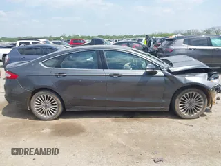 2016 Ford Fusion Titanium with VIN 3FA6P0K97GR217062, listed as a IAAI auction lot 42044943 with Not Provided miles and . Bid and sale history available at carsss.com. Image 14.