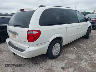 2005 Chrysler Town & Country LX with VIN 2C4GP44RX5R590022, listed as a IAAI auction lot 42058881 with 191,272 mi miles and . Bid and sale history available at DreamBid. Image 4.