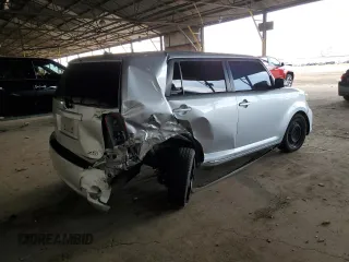 2012 Scion xB with VIN JTLZE4FE5CJ023537, listed as a Copart auction lot 55863315 with 230,648 mi miles and Salvage Title. Bid and sale history available at DreamBid. Image 3.