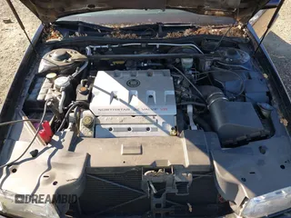2001 Cadillac Eldorado Touring ETC z VIN 1G6ET12961B100627, wystawiony jako IAAI lot #41458966 z przebiegiem 113 620 mil mil oraz . Historia ofert i sprzedaży dostępna na DreamBid. Obrazek 10.