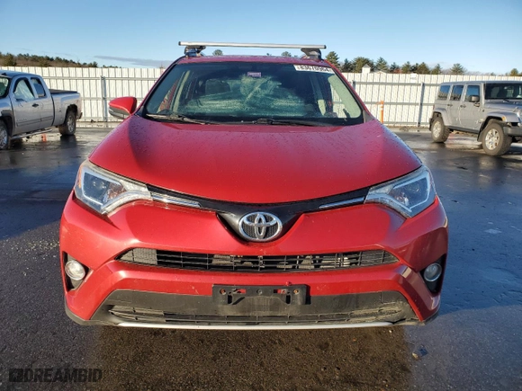 2016 Toyota RAV4 XLE with VIN JTMRFREV0GJ086087, listed as a Copart auction lot 83670964 with 83,045 mi miles and Salvage Title. Bid and sale history available at carsss.com. Image 5.