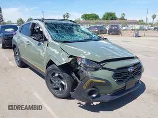 2024 Subaru Crosstrek Special Sports with VIN 4S4GUHF64R3769105, listed as a IAAI auction lot 42012775 with 26,586 mi miles and . Bid and sale history available at DreamBid. Image 1.